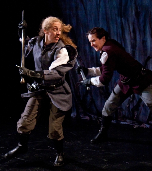 Macduff (Amy E. Harmon) defends herself from Macbeth (Kathrynne Wolf) Photo
